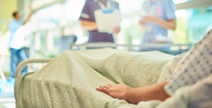 healthcare staff caring for a patient