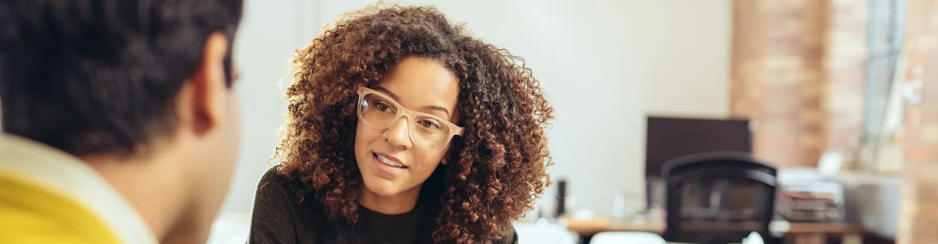 Nurse discussing and assessing a client's needs