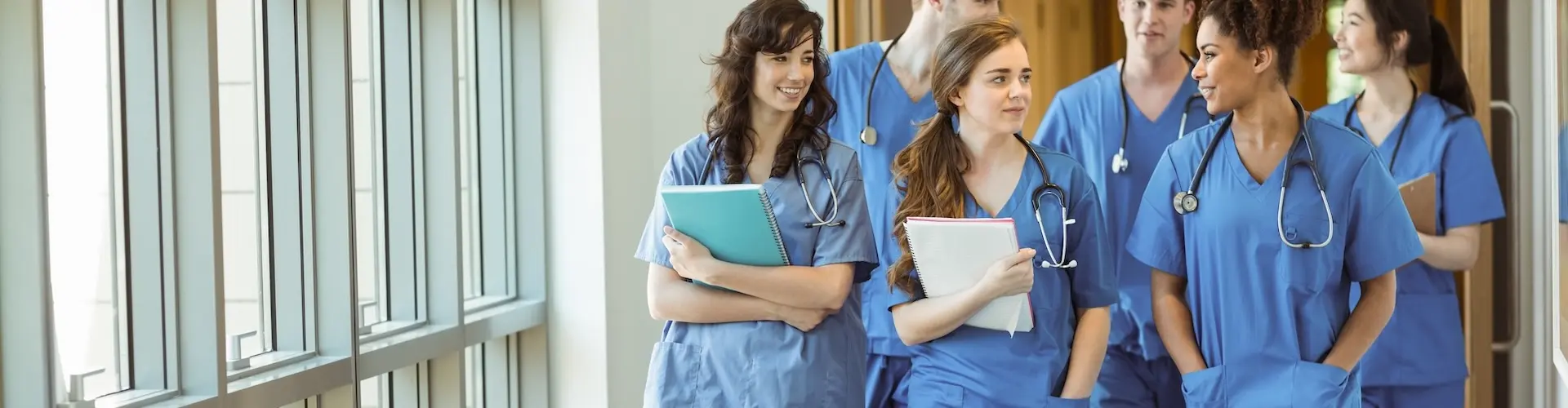 Group of nurses walk and chatting