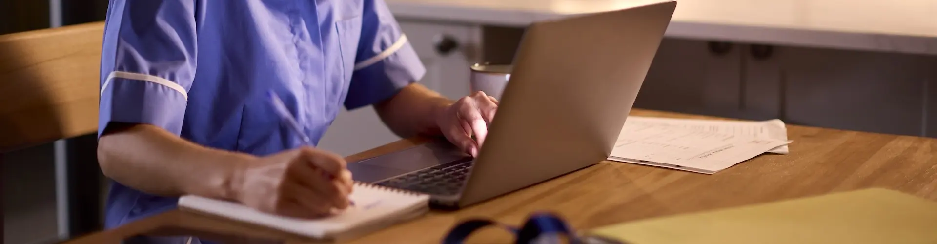Nurse working on a laptop