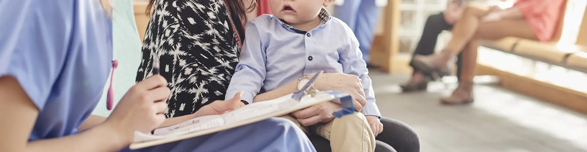 Paediatric nurse with child