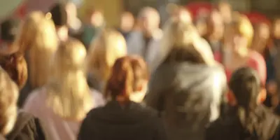 Soft focus view of a crowd of people