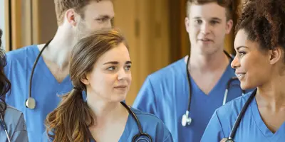 Student nurses discussing amongst themselves